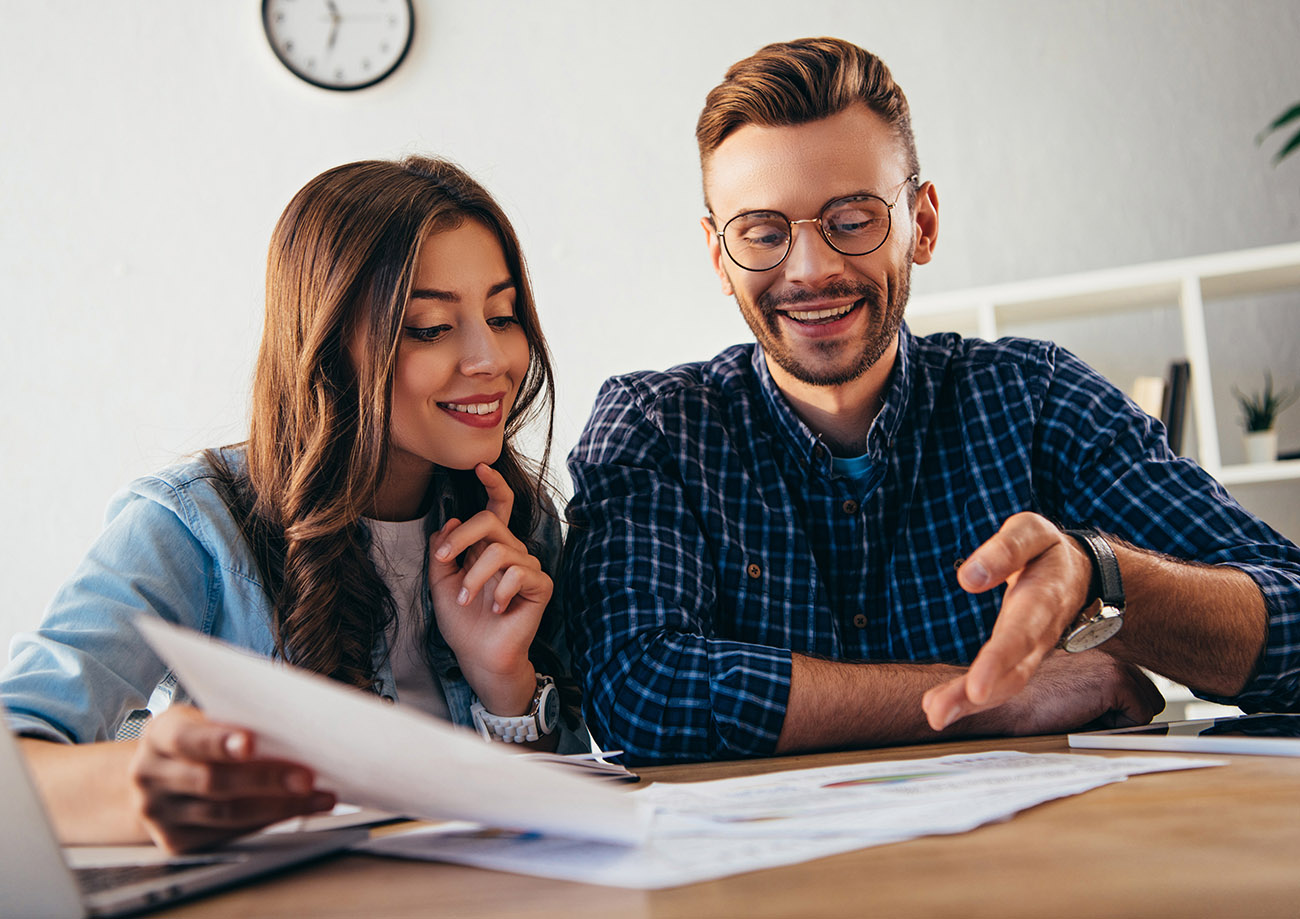 Couple reading their home inspection report 